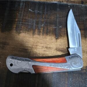 TIMBER WOLFFolding Pocket Knife Lockback Scroll Worked Handle W/Wood Inlay
